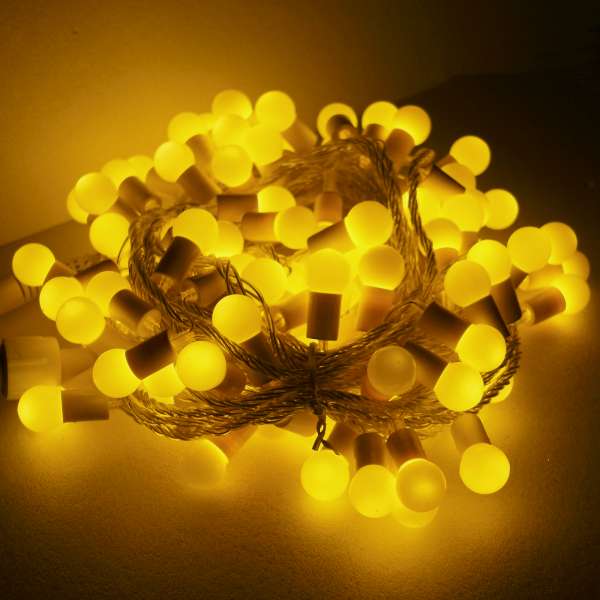 摩達客 聖誕燈100燈LED圓球珍珠燈串(插電式/暖白光透明線/ 附控制器跳機)(高亮度又省電)