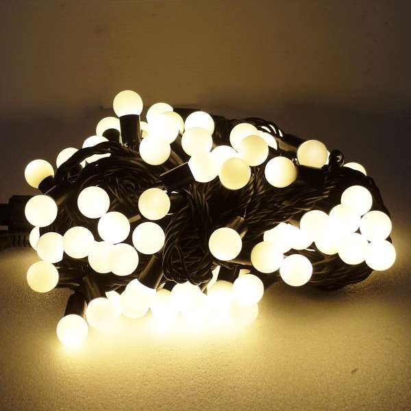 摩達客 聖誕燈100燈LED圓球珍珠燈串(插電式/暖白光黑線/ 附控制器跳機)(高亮度又省電)