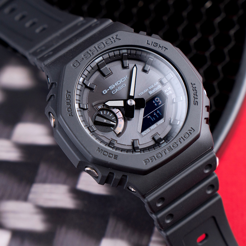 【CASIO 卡西歐】G-SHOCK 八角錶殼耐衝擊運動太陽能藍芽雙顯橡膠腕錶/黑(GA-B2100-1A1)