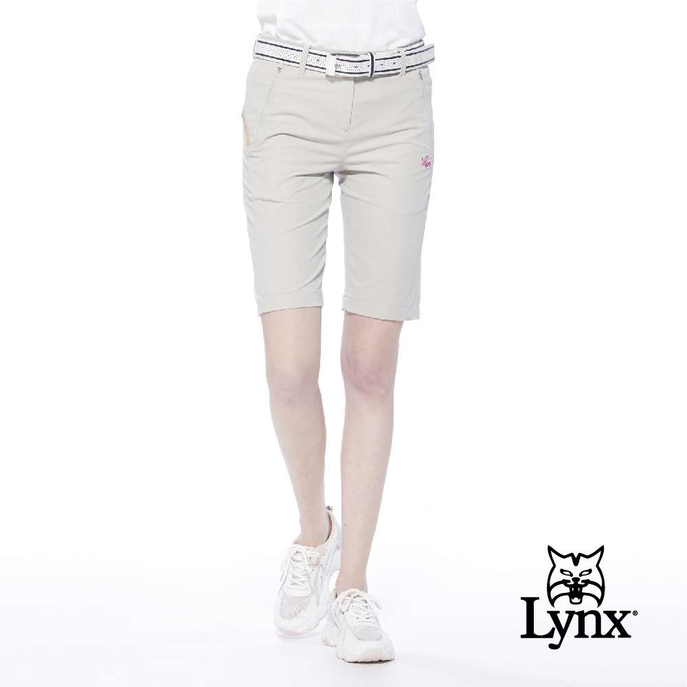 【Lynx Golf】女款吸濕排汗彈性舒適拉鍊口袋織帶設計直筒五分褲(二色)