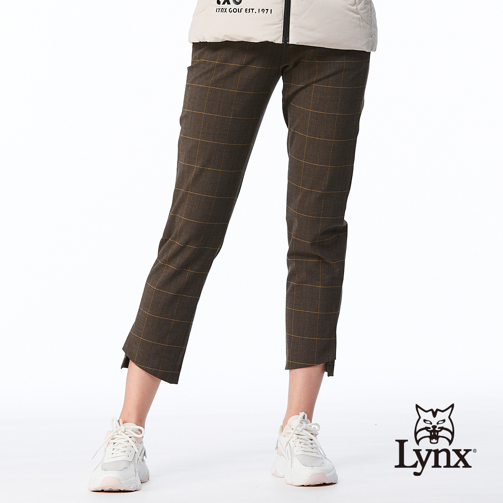 【Lynx Golf】女款日本進口布料彈性舒適西褲造型開杈設計方格拉鍊口袋窄管八分褲-深卡其色