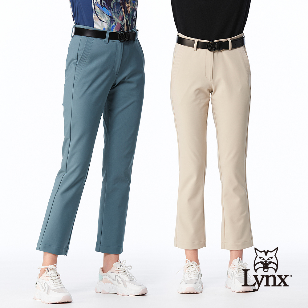 【Lynx Golf】女款彈性舒適口袋壓線造型緹織LOGO鬆緊帶剪接設計靴型九分褲(