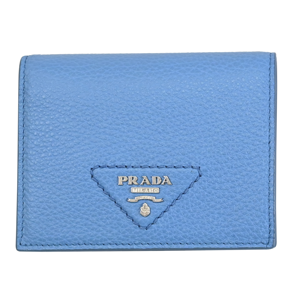 PRADA 1MV204 三角浮雕LOGO荔枝牛皮對開零錢短夾.藍